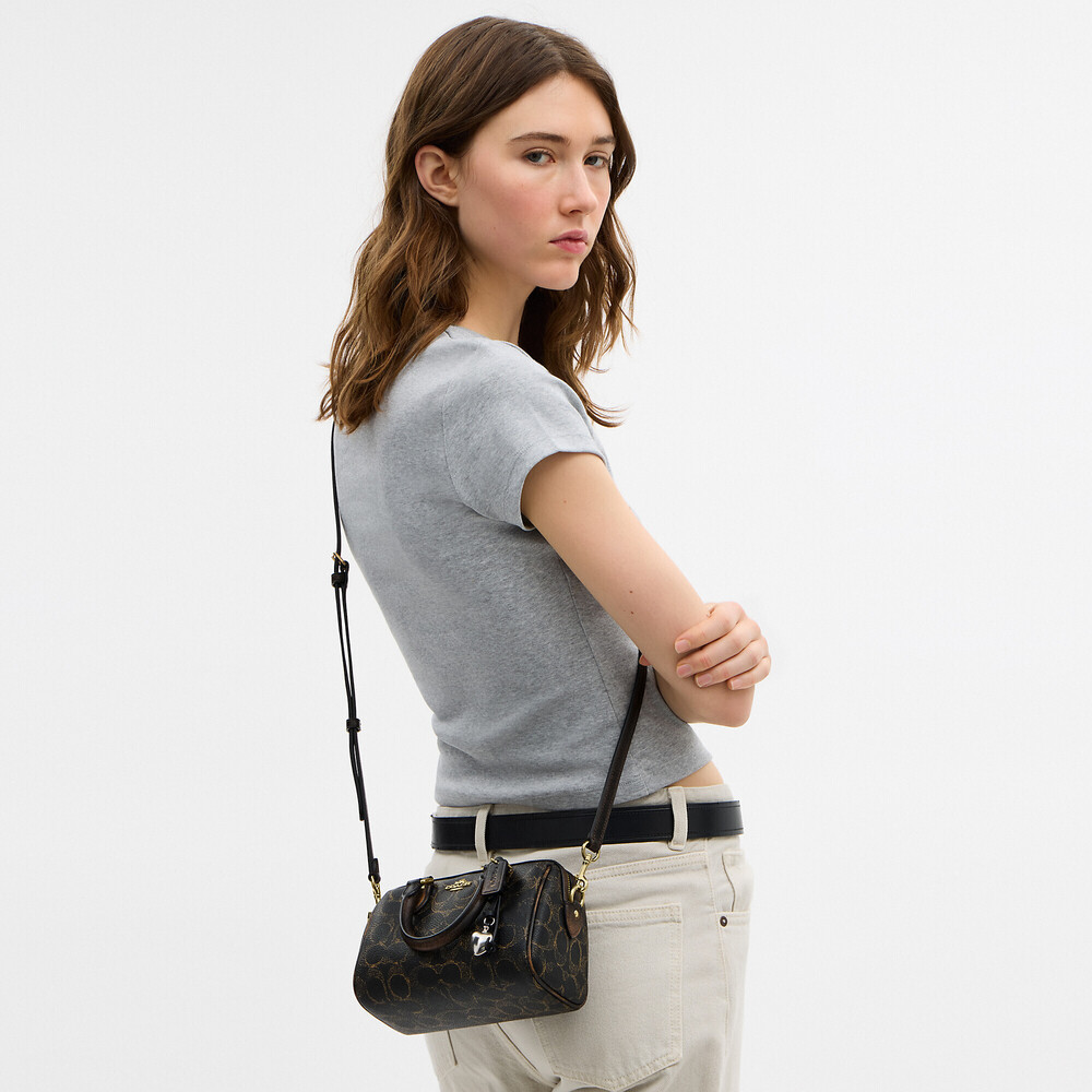 Coach Outlet Mini Rowan Crossbody Bag In Loved Signature Canvas With Charms
